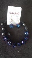 Parure shamballa résine