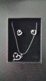 Collier et boucles d'oreilles coeur